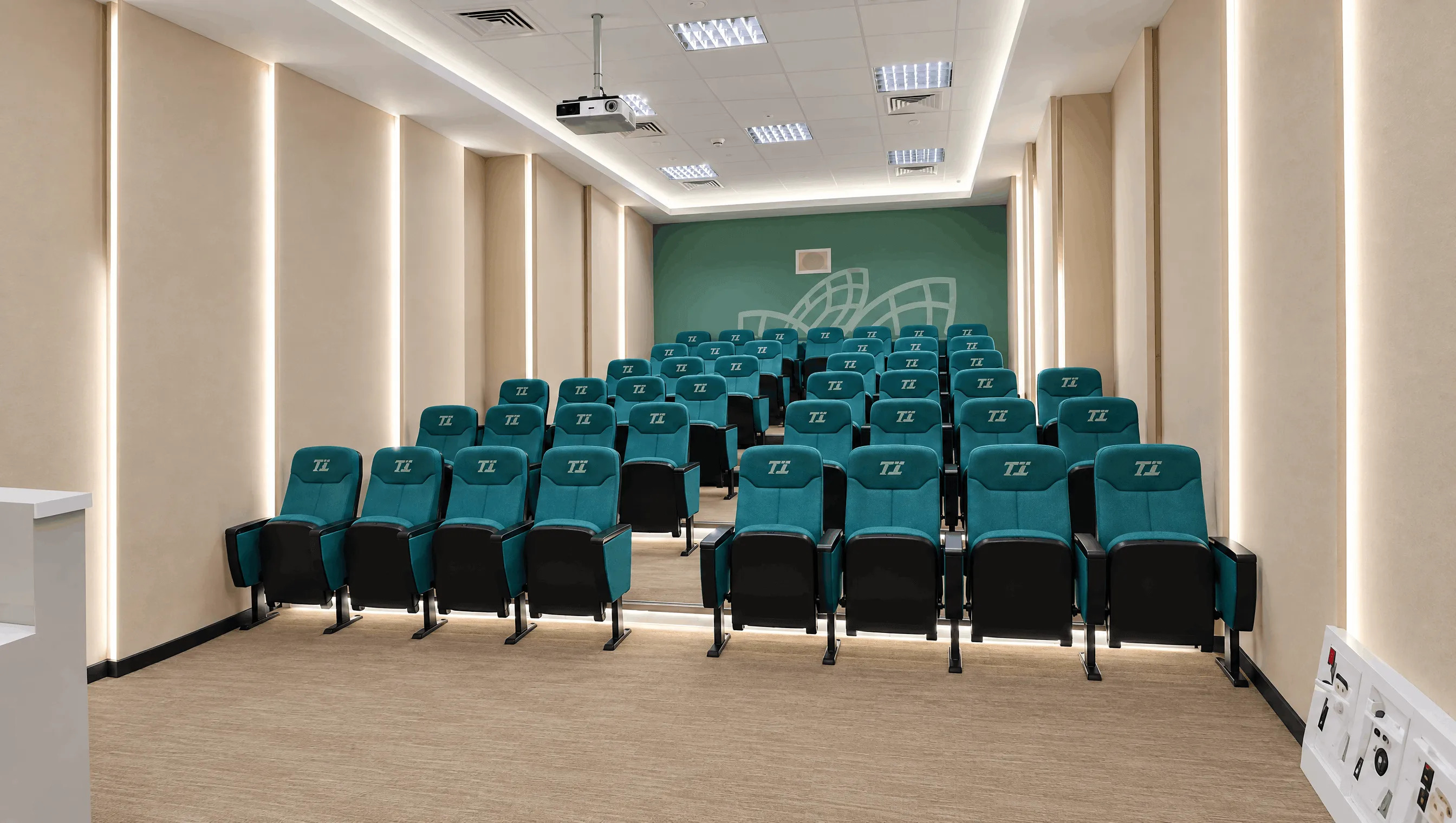 Second view of the Tasreea training room in Abu Dhabi with seating and presentation setup